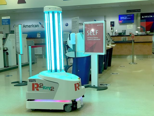 When patrolling airport spaces after hours, the coronavirus-fighting robot 'R2Key2' emits high-intensity ultraviolet UV-C wavelength light that kills harmful pathogens in the air and on surfaces.