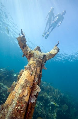 The iconic nine-foot-high "Christ of the Deep," a 4,000-pound bronze statue installed as an underwater shrine is located inside the Florida Keys National Marine Sanctuary. Image by Stephen Frink